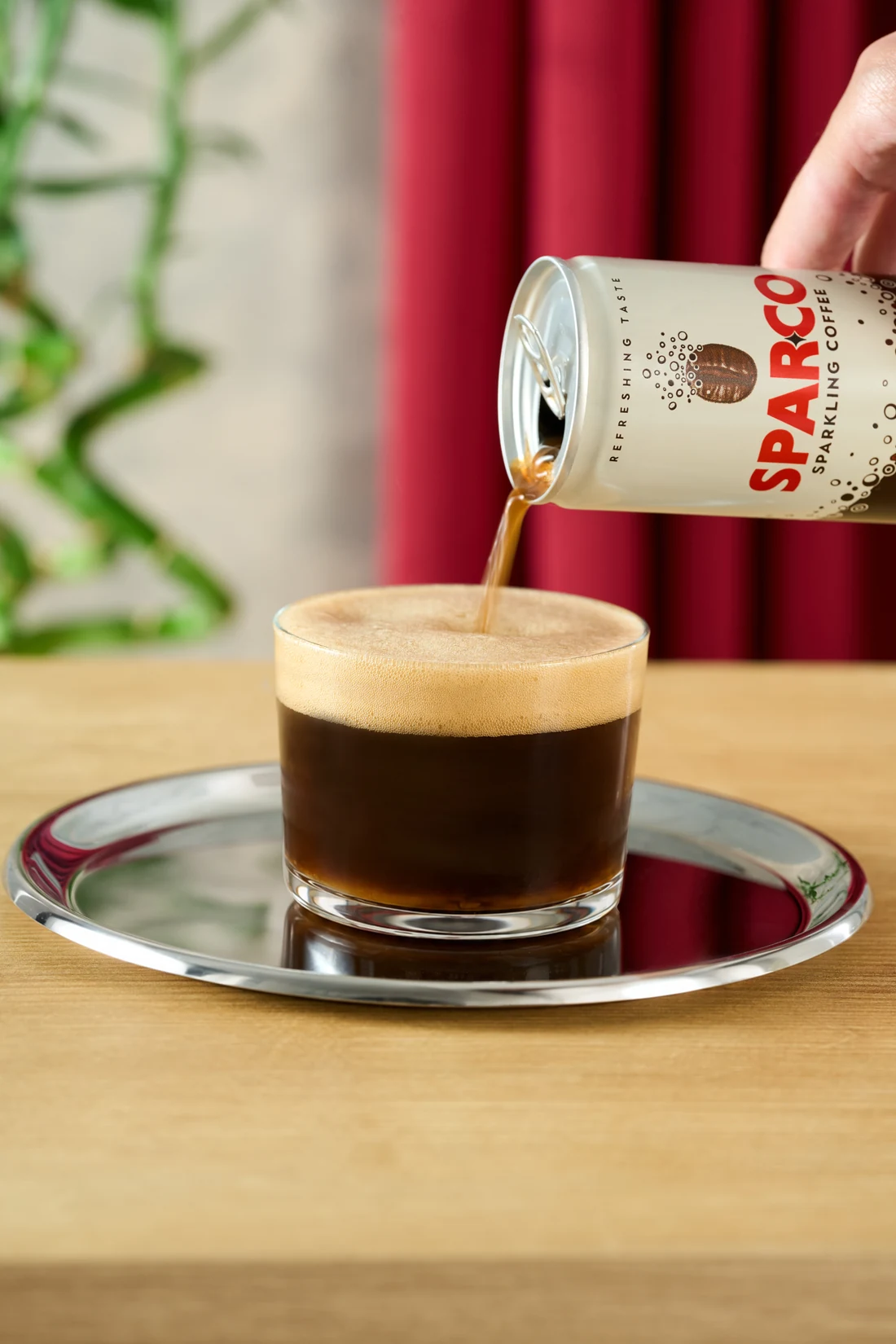 Sparco cold coffee poured into a glass